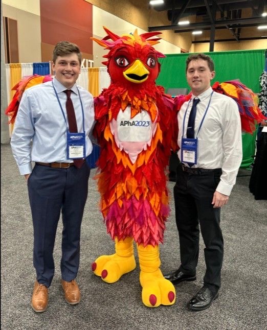 Zachary Paulsen and Evan Slonac posing at APhA.