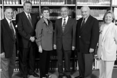 2003 Citation recipients: Dr. Holly Mason, Pamela Ploetz, Dr. Charles Sih, and Dr. Leon Lachman, with Dean Emeritus Mel Weinswig (left) and Dean Jeanette Roberts (right).