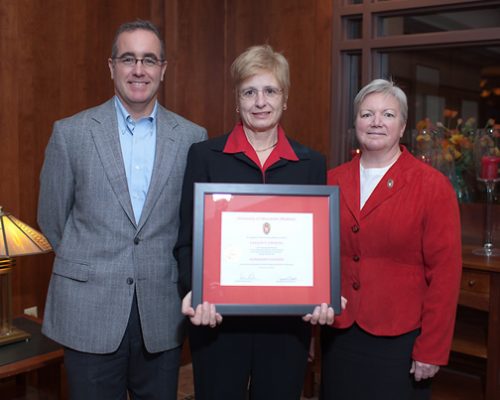 Citation recipient Dr. Earlene Lipowski (center) with Dean Jeanette Roberts (right) and Brian Mc Ilhone (left)
