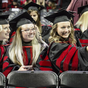 Pharmacy doctoral graduates Taryn Hinners, Lauren Arndt, and Amy Hoffman (left-right) take a selfie at the Kohl Center.
