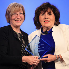 photo of Mary Jo Knobloch receiving award