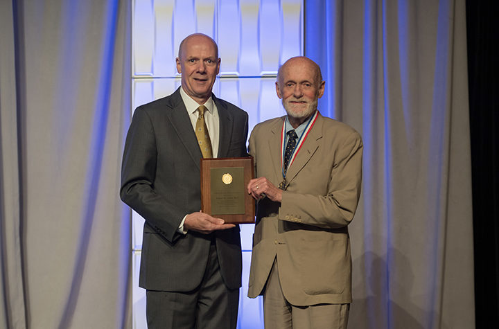 Palmer Taylor (right) accepts the 2017 AACP Volwiler Research Achievement Award from Joseph T. DiPiro, Pharm.D., Dean and Archie O. McCalley Chair, Virginia Commonwealth University School of Pharmacy; and 2016-2017 AACP President.