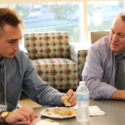 Brett Kelly, assistant professor in the School's Division of Pharmacy Professional Development, brings his background as a managed care pharmacist with extensive leadership experience to mentor PharmD students like Jalen McMartin (DPH-2) in the Leadership Certificate and Mentor Program.