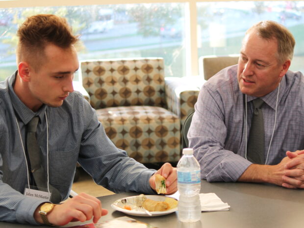 Brett Kelly, assistant professor in the School's Division of Pharmacy Professional Development, brings his background as a managed care pharmacist with extensive leadership experience to mentor PharmD students like Jalen McMartin (DPH-2) in the Leadership Certificate and Mentor Program.