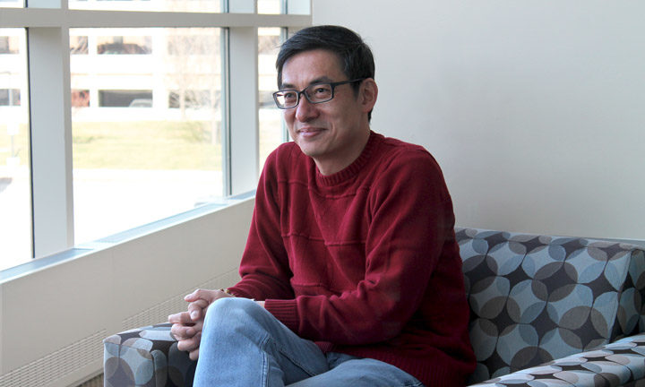 Richard Hsung sitting in a chair