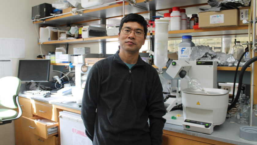 Weiping Tang in his lab