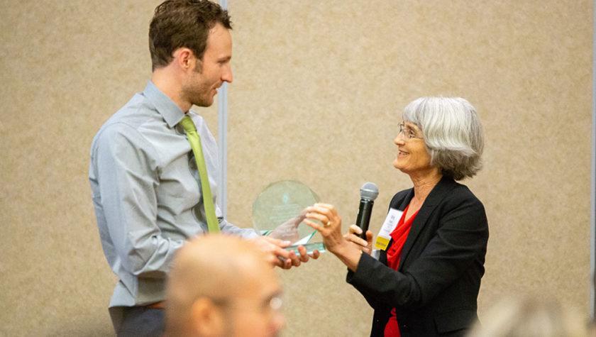 Paul Jest receiving his award from Mara Kieser