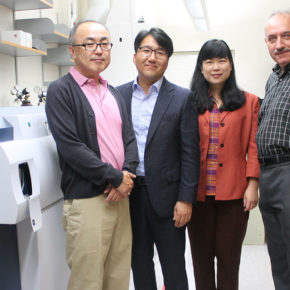 Glen Kwon, Seungpyo Hong, Lingjun Li, and Sandro Mecozzi standing in a lab