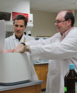 Mark Sacchetti and Ed Elder working together in the lab