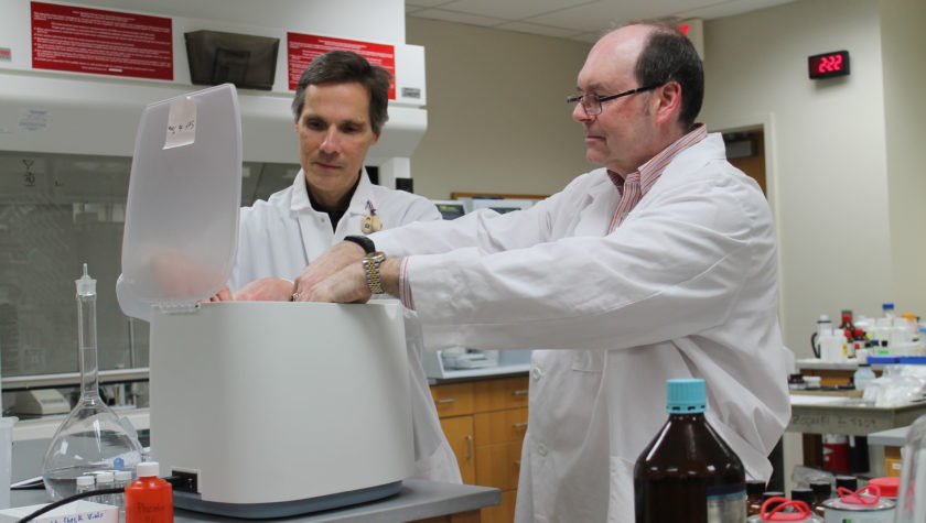 Mark Sacchetti and Ed Elder working together in the lab