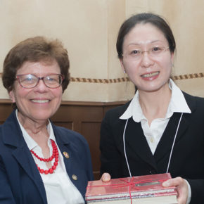 Assistant Professor Jiaoyang Jiang and Chancellor Rebecca Blank.
