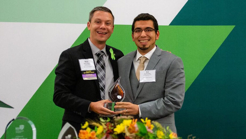 Ed Portillo accepts his Distinguished Young Pharmacist Award