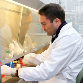 Associate Professor Warren Rose in his lab working at fume hood