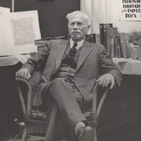 Black and white image of Edward Kremers in a chair.