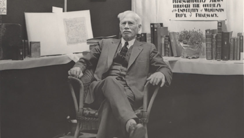 Black and white image of Edward Kremers in a chair.