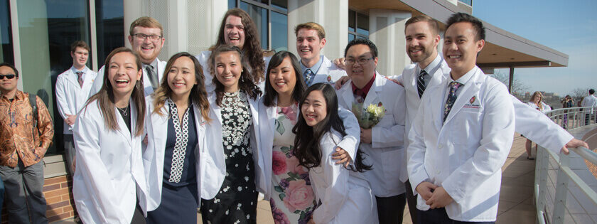 students in white coats