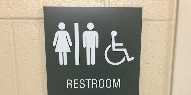 All gender bathroom sign