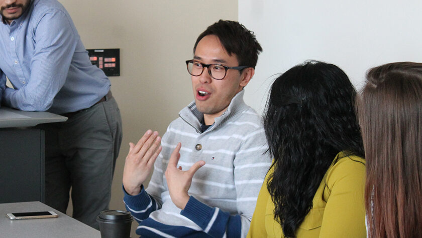 Tony Tam speaking on a student panel