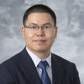 portrait of Assistant Professor Quanyin Hu, of the School of Pharmacy's Pharmaceutical Sciences Division.