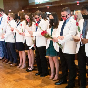 PharmD students in the Class of 2025 take the Oath of the Pharmacist at their White Coat Ceremony.