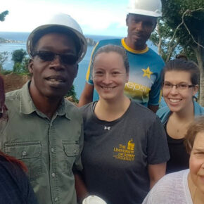 Jeanine Abrons in a group of colleagues in Dominica