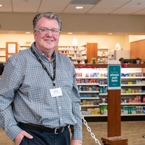 John Weitekamp standing in his pharmacy