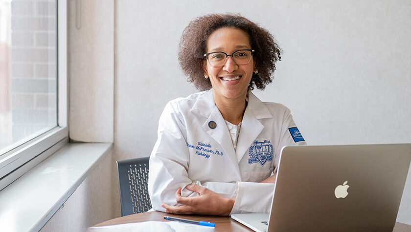 Gabrielle Winston-McPherson, working at a table