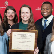 (Back row) Associate Professor Andrea Porter and PharmD student Michael Nome. (Front row) PharmD students Rachel Hawley, Brianna Groen, and Taylor Shufelt, with their award for Best National Chapter Runner-Up. | Photo by Todd Brown