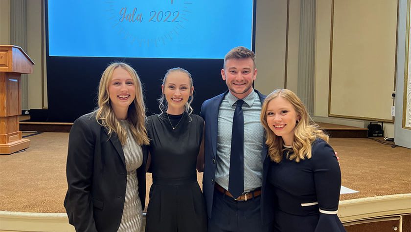 Group photo of Emily LaMonte, Abbey Woodward, Austin Stark, and Taylor Shufelt