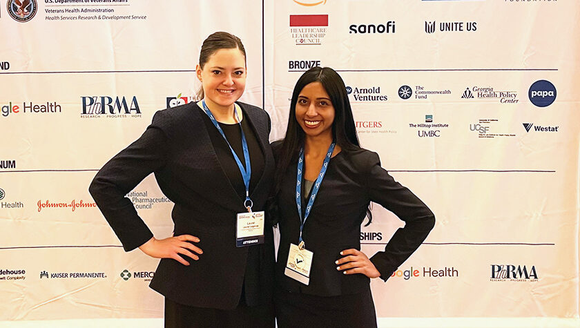 Laurel Lenza and Apoorva Reddy together at 2022 Health Datapalooza banner of contributors