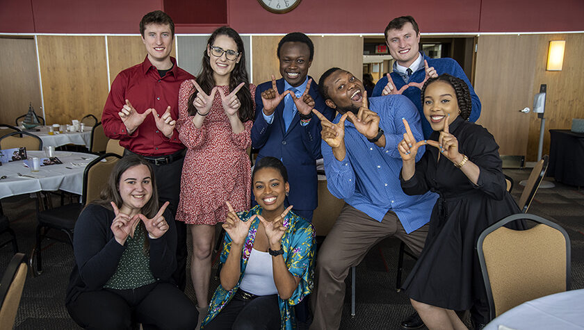 PharmD students grab a silly photo op after the 2022 School of Pharmacy Scholarship Brunch. Front row: Madeline Szubert, Maria Hill. Back row: McKay Carstens, Caroline Palay, Vincent Elijah, Michael Nome, Kane Carstens, and Mary Ann Egbujor