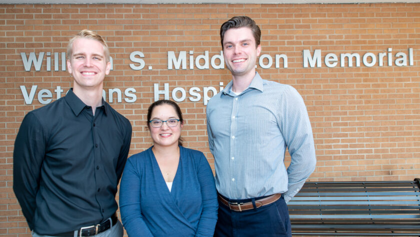 Tyler Albright, Amanda Margolis, and Ryan Simonet outside of the William S. Middleton Memorial Veterans Hospital