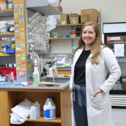 Cecilia Volk standing in a lab