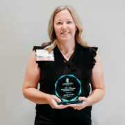 Amy Kulig holding her glass IPPE Clinical Instructor Excellence Award