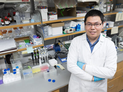 Quanyin Hu in his lab