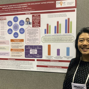 Jenny Li presents a poster at the annual APhA meeting.