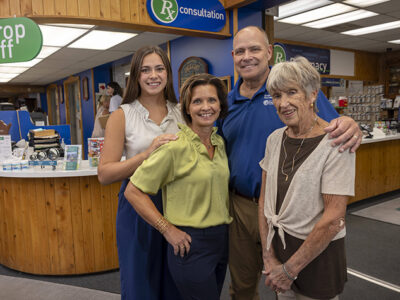 Avery, Jessica, Tim and Jana Dreier pose in the pharmacy