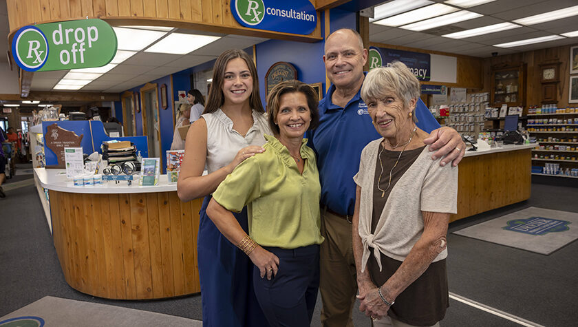 Avery, Jessica, Tim and Jana Dreier pose in the pharmacy