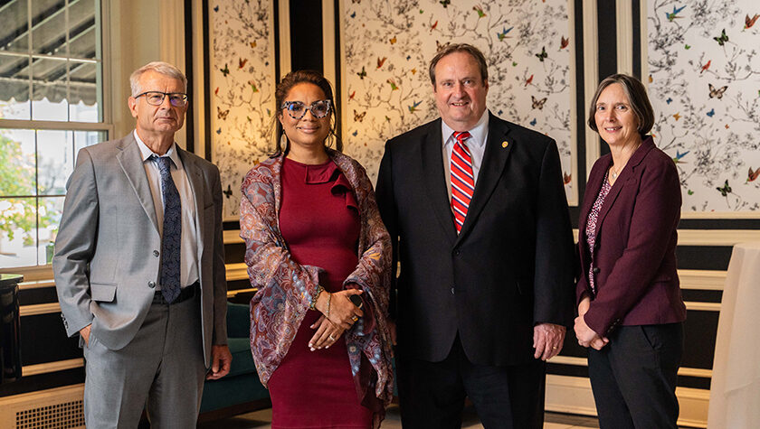 Evgenyi Shalaev, Yolanda Tolson, Steve Swanson, and Lynne Taylor pose for a photo