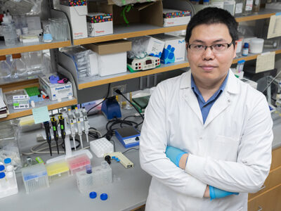 Quanyin Hu in his lab