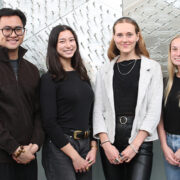 PharmD students pose in the School's atrium