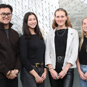 PharmD students pose in the School's atrium