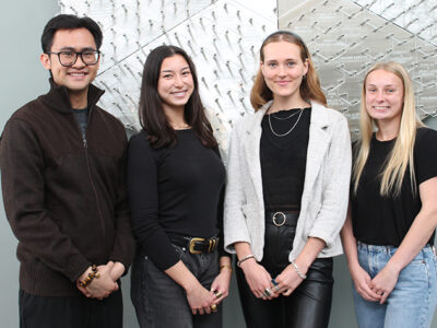 PharmD students pose in the School's atrium