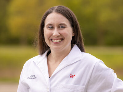 Jenny Donar portrait outside in a white coat
