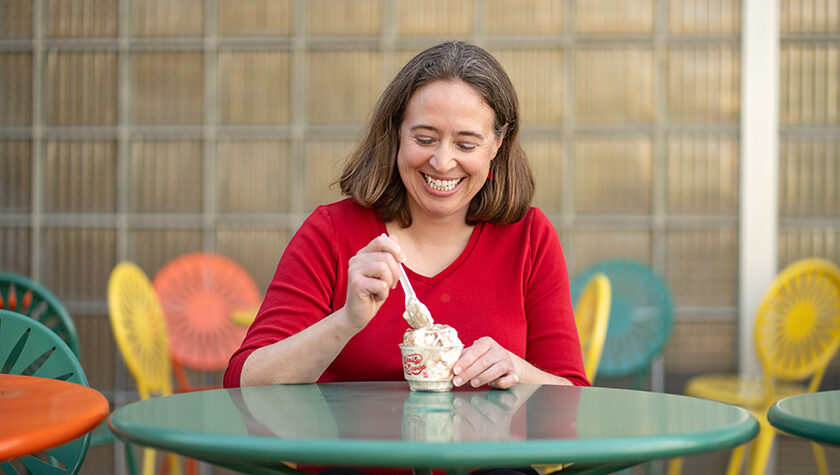 Kim Lintner eating ice cream at the Memorial Union Terrace