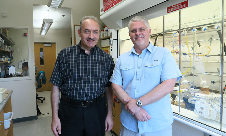 Dr. Sandro Mecozzi with Dr. Michael Taylor in the lab