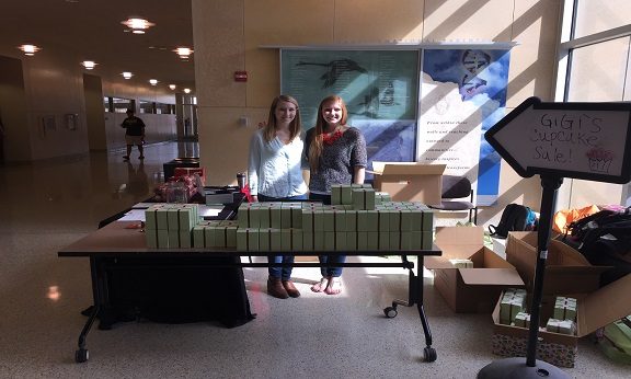 WSPS, ODA students, Kara Wischer, DPH-3 (left) and Emily Blaski, DPH-3, raise awareness about organ donation through the sale of Gigi's Cupcakes at the Health Sciences Learning Center in April.