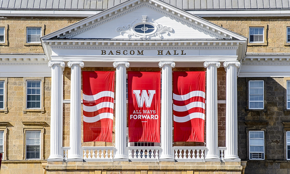 front of Bascom Hall with banners reading "All Ways Forward"