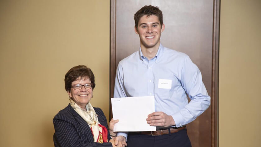 PharmTox student and 2019 Hilldale Fellowship winner Kyle Zielinski with Chancellor Rebecca Blank.
