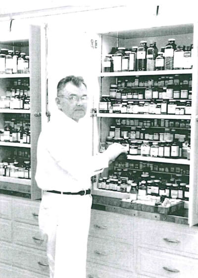 Janis Apinis working in the pharmacy